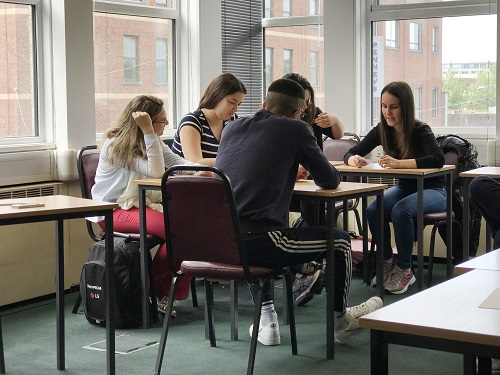 English language school students in a classroom.