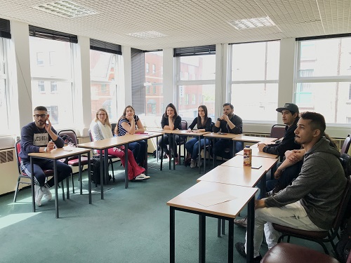 Group of English course students during the class.